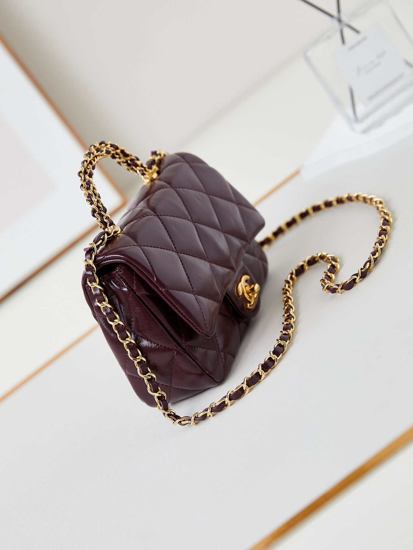 CHANEL FLAP BAG WITH TOP HANDLE 18 IN WINE RED OIL-WAX LAMBSKIN GOLD HARDWARE