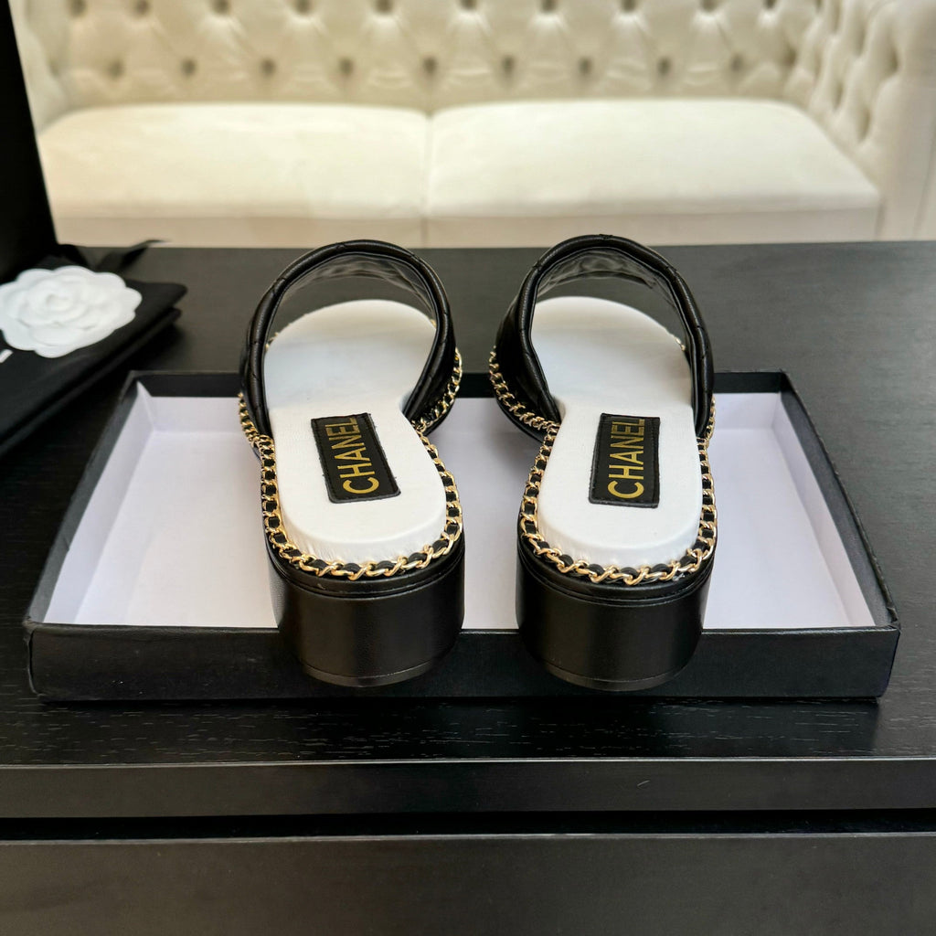 CHANEL HIGH FLATFORM SLIPPER IN BLACK EMBOSSED SHEEPSKIN