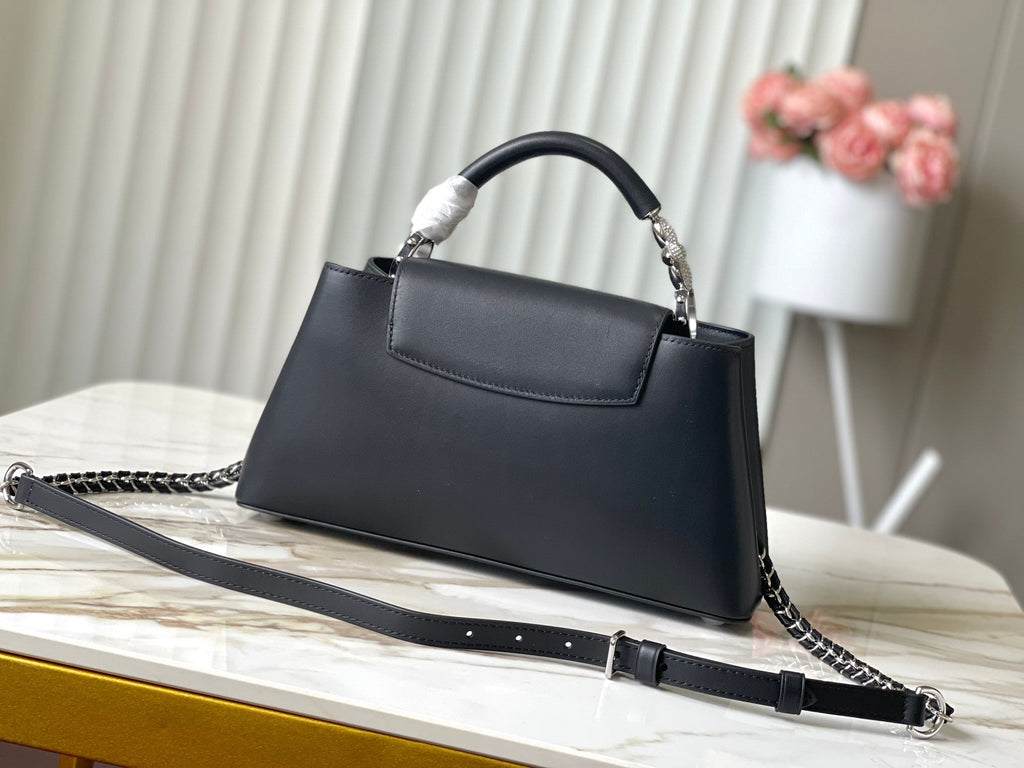 LOUIS VUITTON CAPUCINES EAST-WEST 30 IN BLACK SHEEPSKIN CRYSTAL AND SILVER HARDWARE
