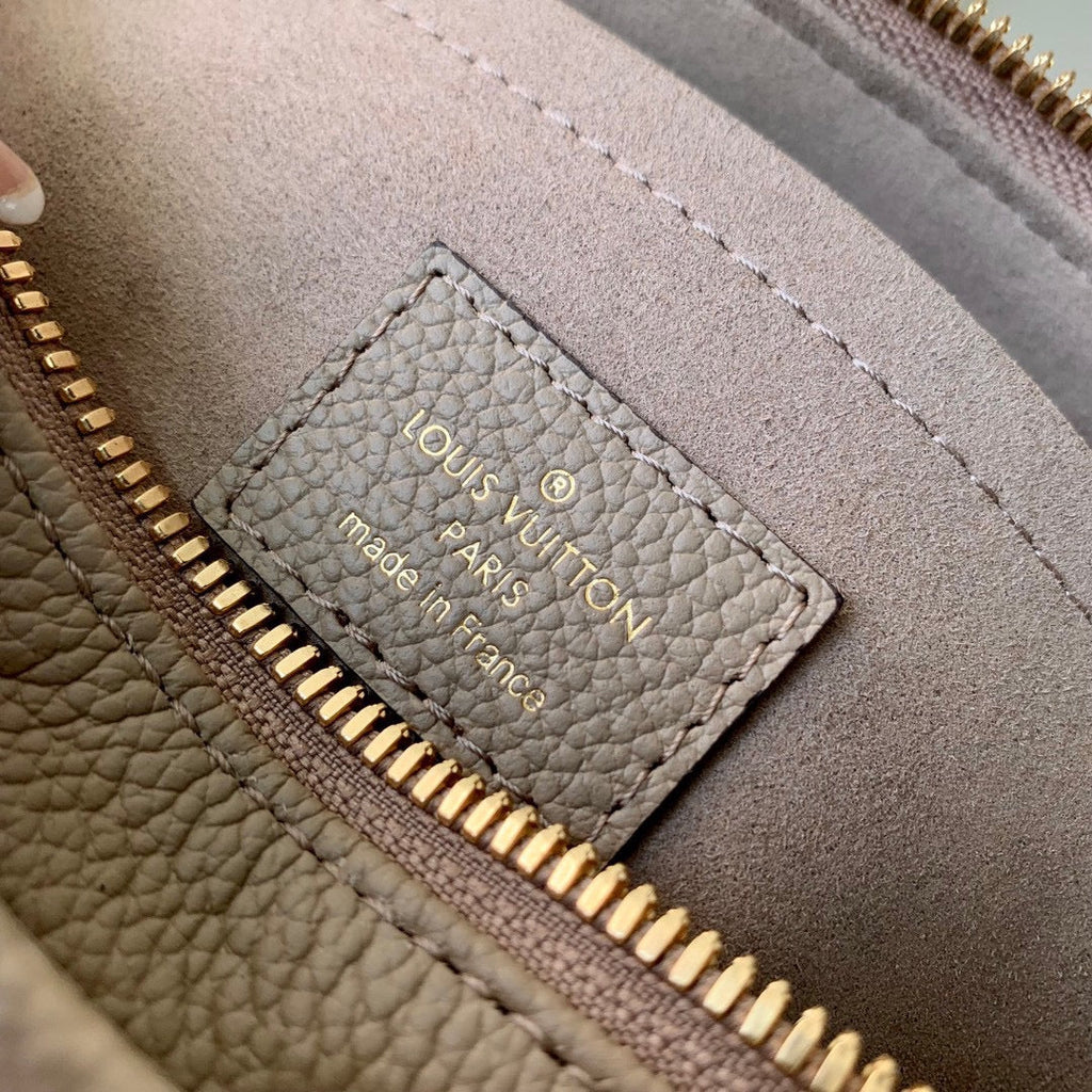 LOUIS VUITTON ONTHEGO EAST WEST BAG 25 IN GREEN MONOGRAM EMBOSSED COWHIDE