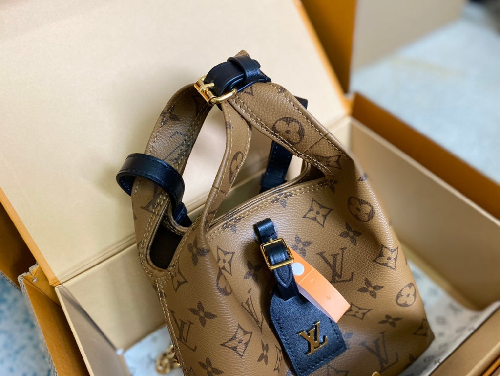 LOUIS VUITTON ATLANTIS BB 17 IN BROWN MONOGRAM REVERSE CANVAS