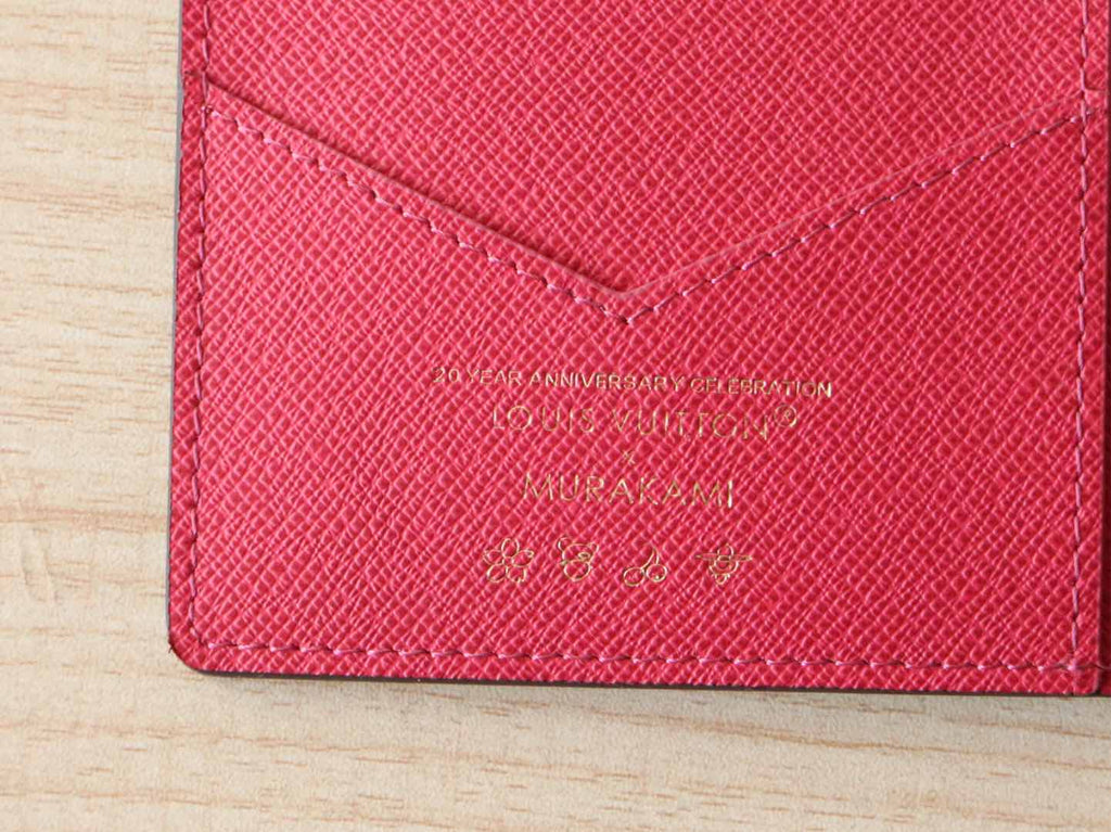 LOUIS VUITTON DOLL PASSPORT WALLET IN CHOCOLATE BROWN MONOGRAM CALFSKIN