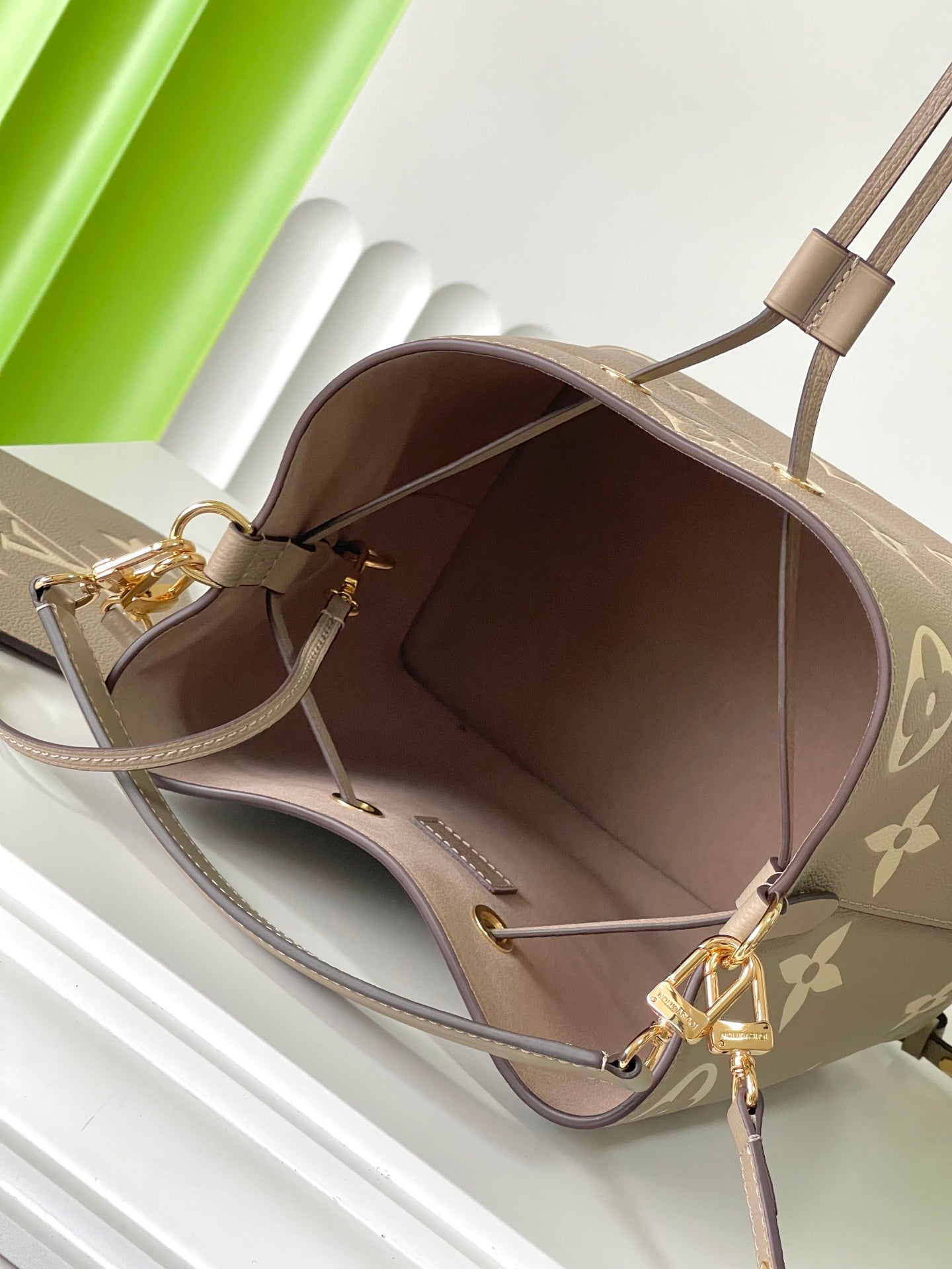 LOUIS VUITTON CRAFTY NEONOE 26 IN BROWN AND CREAM BICOLOR EMPREINTE CALFSKIN