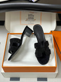 HERMES 25S ORAN HIGH‑HEEL SANDAL 50 MM IN BLACK LAMBSKIN WITH STONE DETAILS