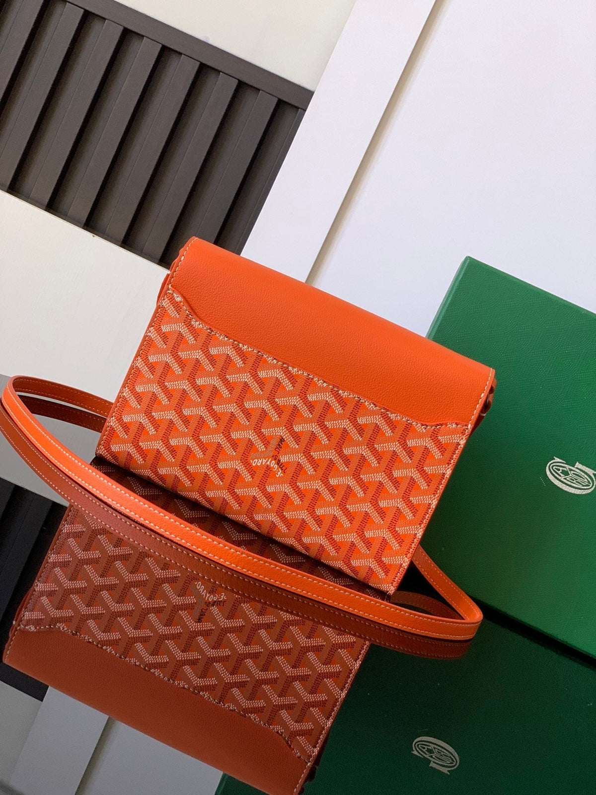 CHYPRE WALLET-POUCH 21 IN ORANGE GOYARDINE CANVAS AND CALFSKIN