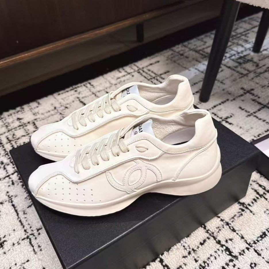 CHANEL CLASSIC SNEAKERS IN WHITE SHEEPSKIN